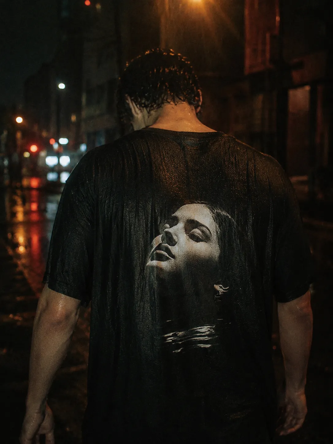 The UNDERTOW tee worn, the print large across the back.